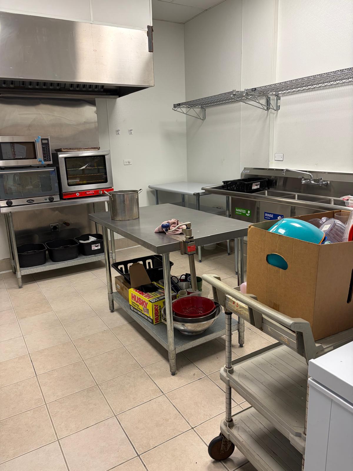 On-site commercial kitchen with stainless steel equipment